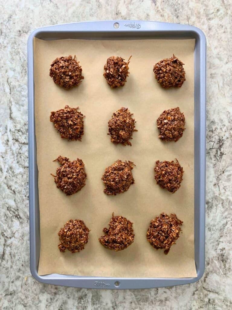 chocolate coconut macaroons placed on a cookie sheet