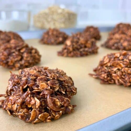 chocolate coconut macaroons placed on a baking sheet with parchment paper