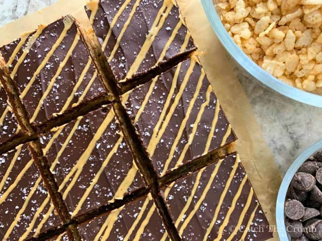 peanut butter and chocolate rice krispies bars sitting on a countertop