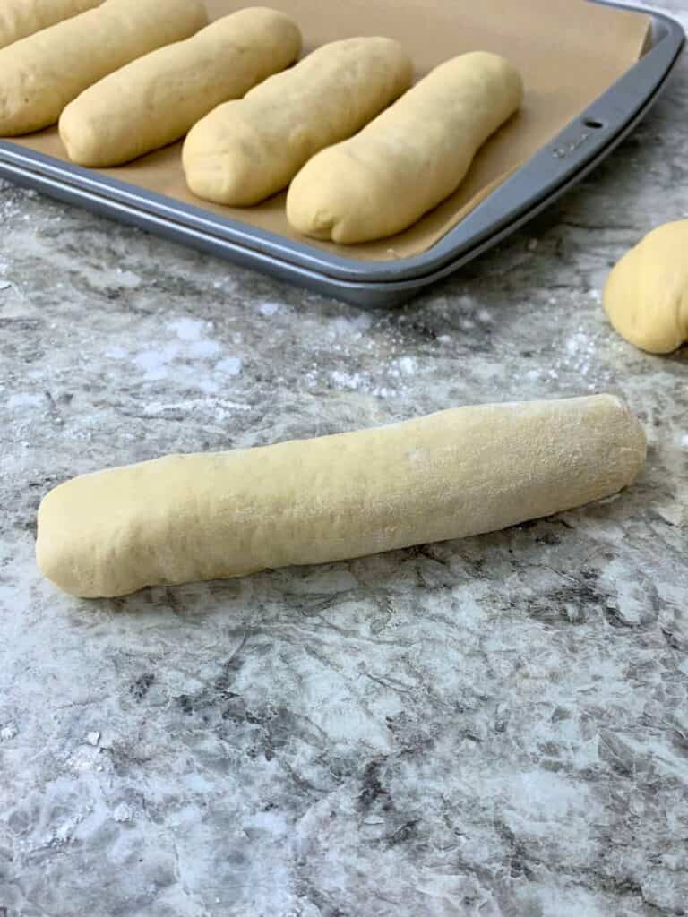 Placing the bun seam-side down