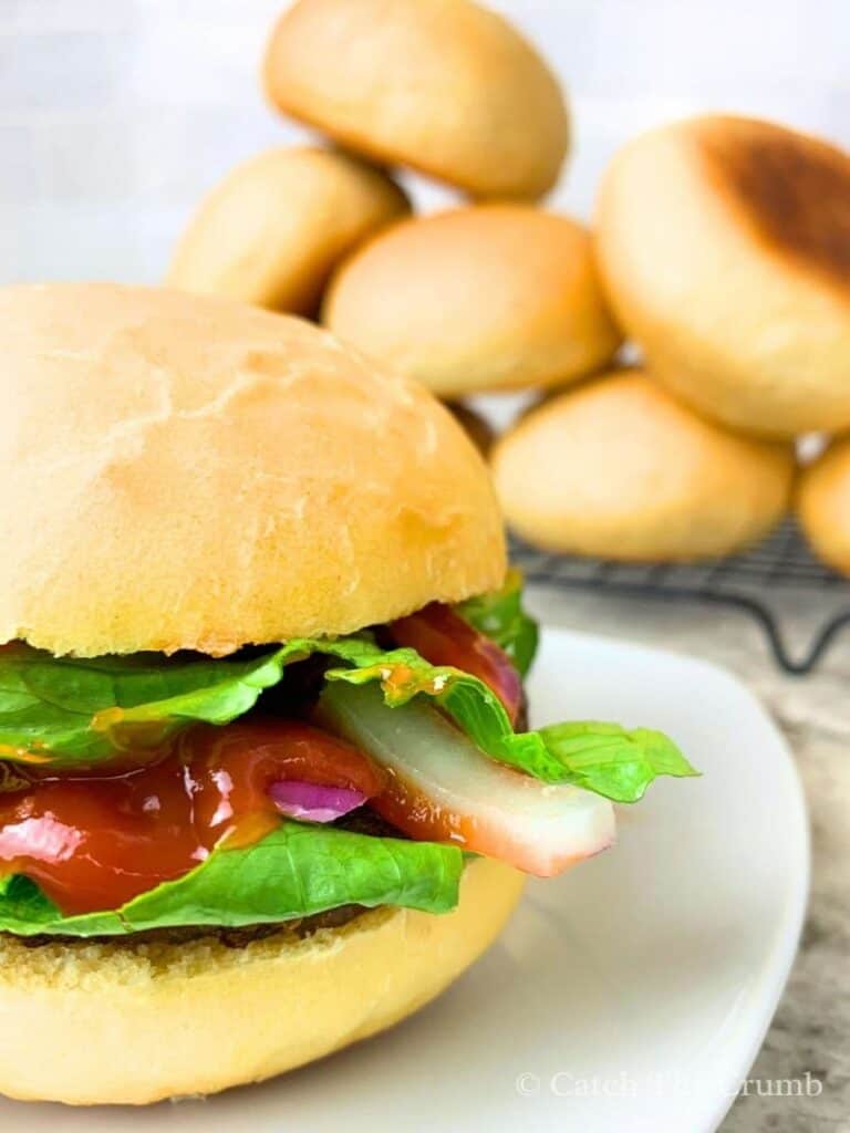 a hamburger served on a sourdough discard hamburger bun