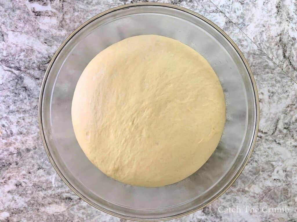 dough in a lightly oiled mixing bowl risen until doubled in size