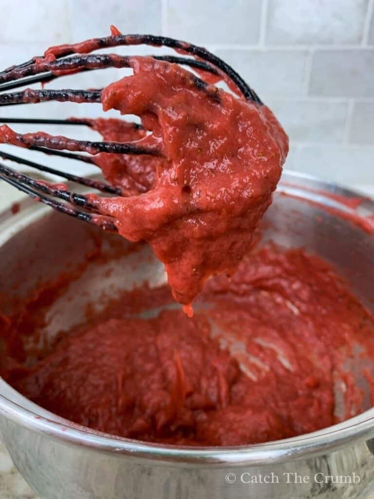 mashed strawberries in a thick, jammy consistency