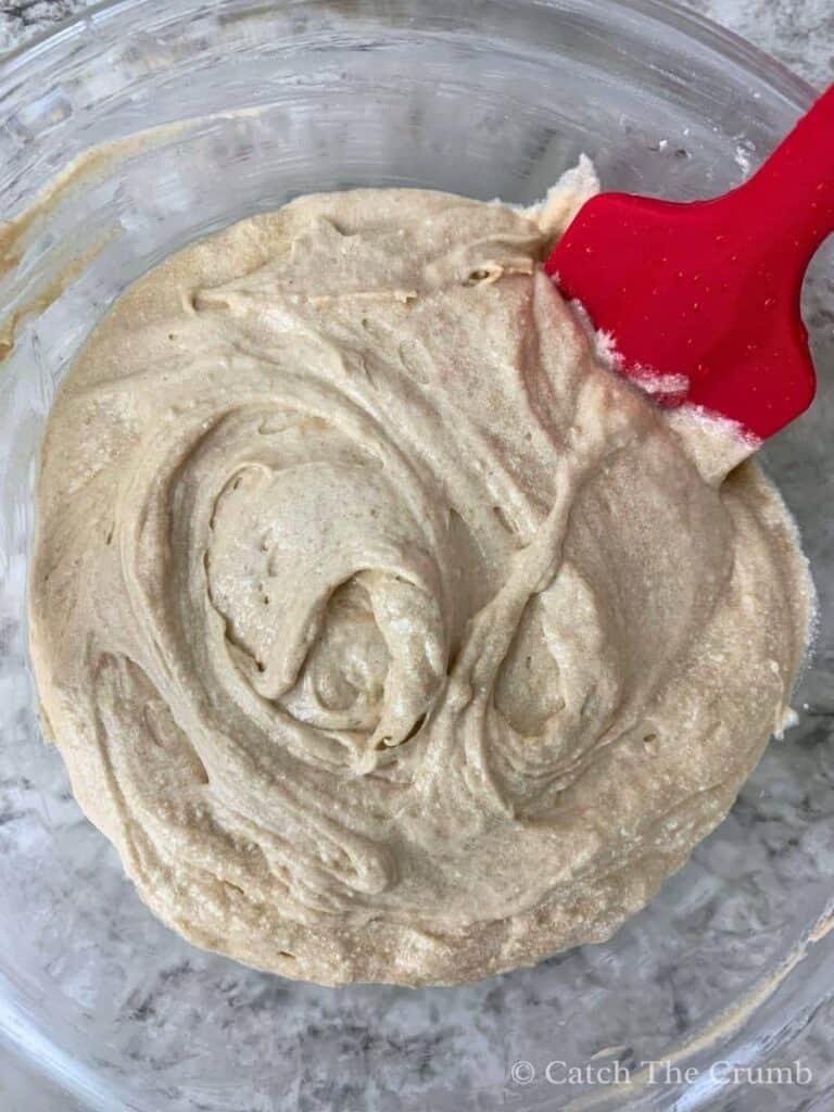 mixing the dry and wet mixtures in a mixing bowl