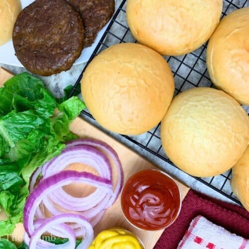 sourdough discard hamburger buns served with burgers and toppings