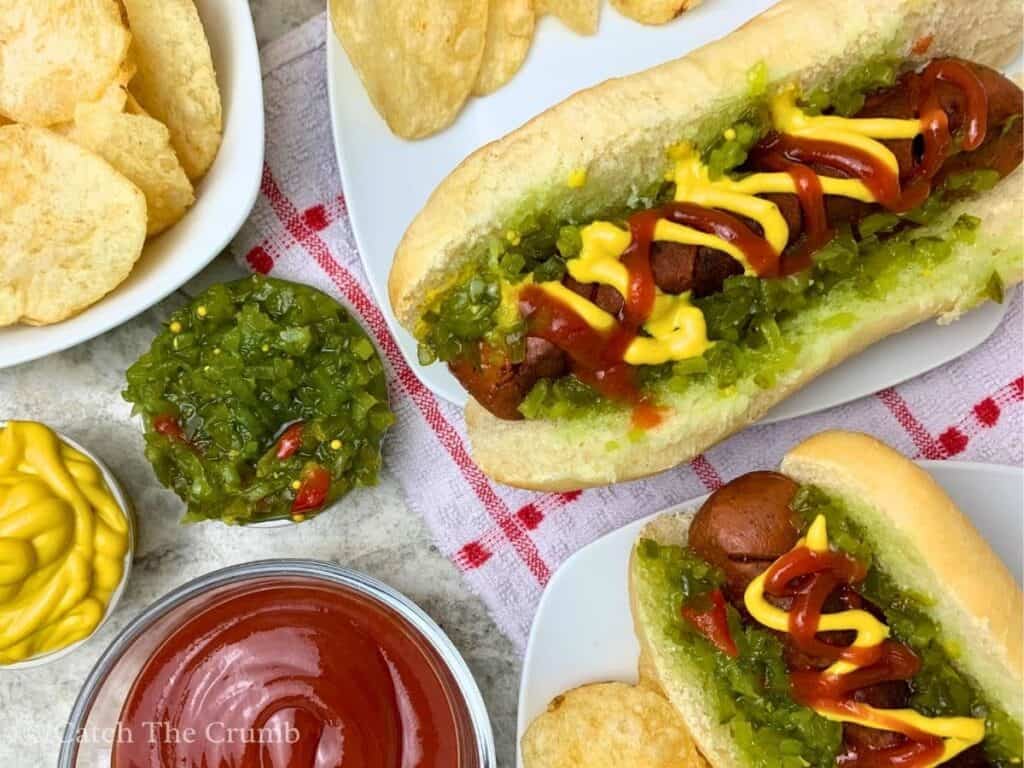 sourdough discard hot dog buns served with chips, ketchup, mustard, and relish