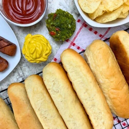 sourdough discard hot dog buns served with chips, ketchup, mustard, and relish