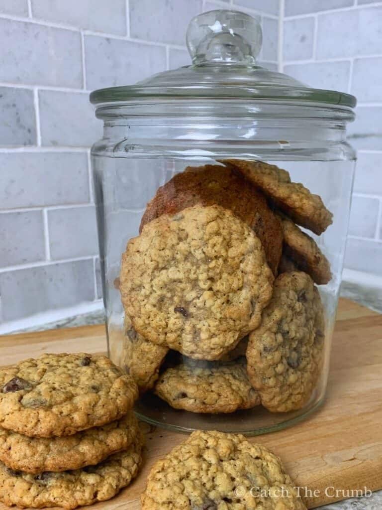sourdough discard oatmeal chocolate chip cookies in a cookie jar