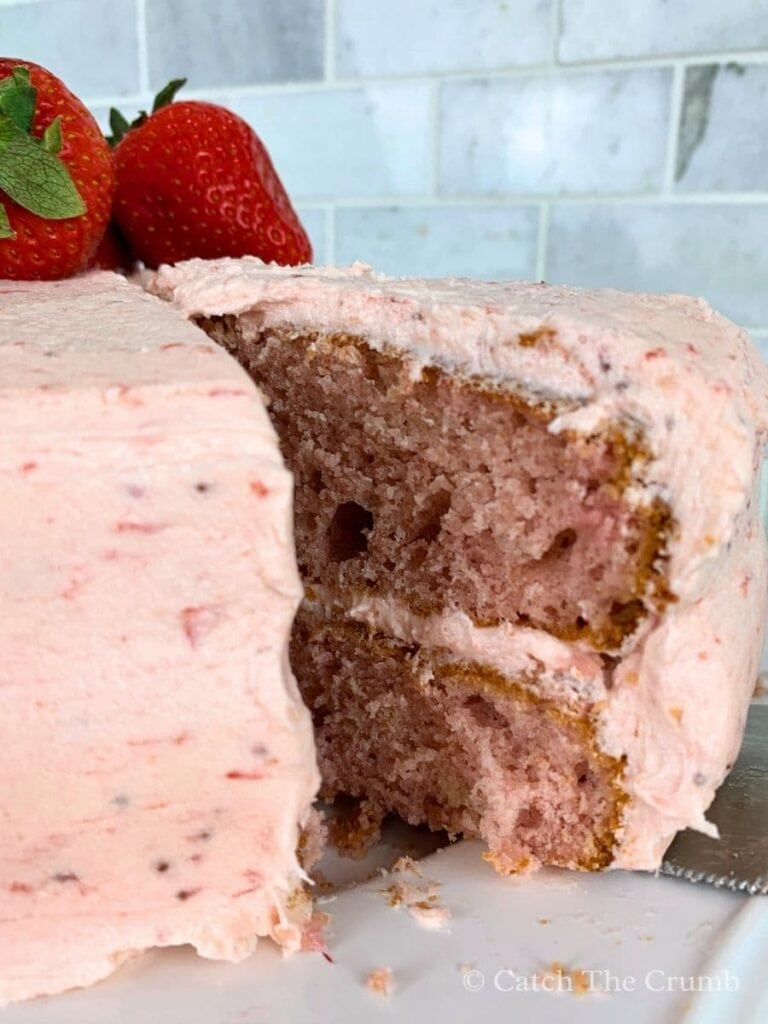sourdough strawberry cake with a slice cut out