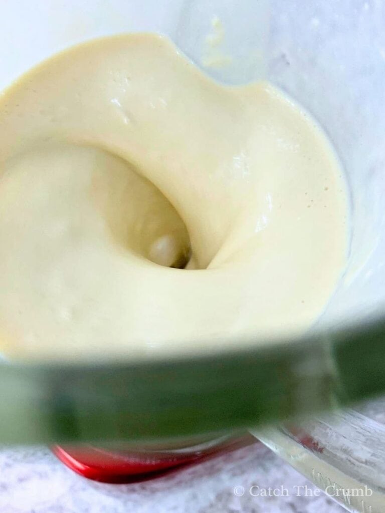 the ingredients being mixed in a blender ingredients placed in a blender