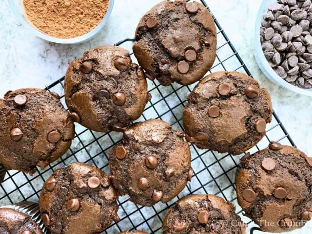 sourdough chocolate muffins on a wire rack