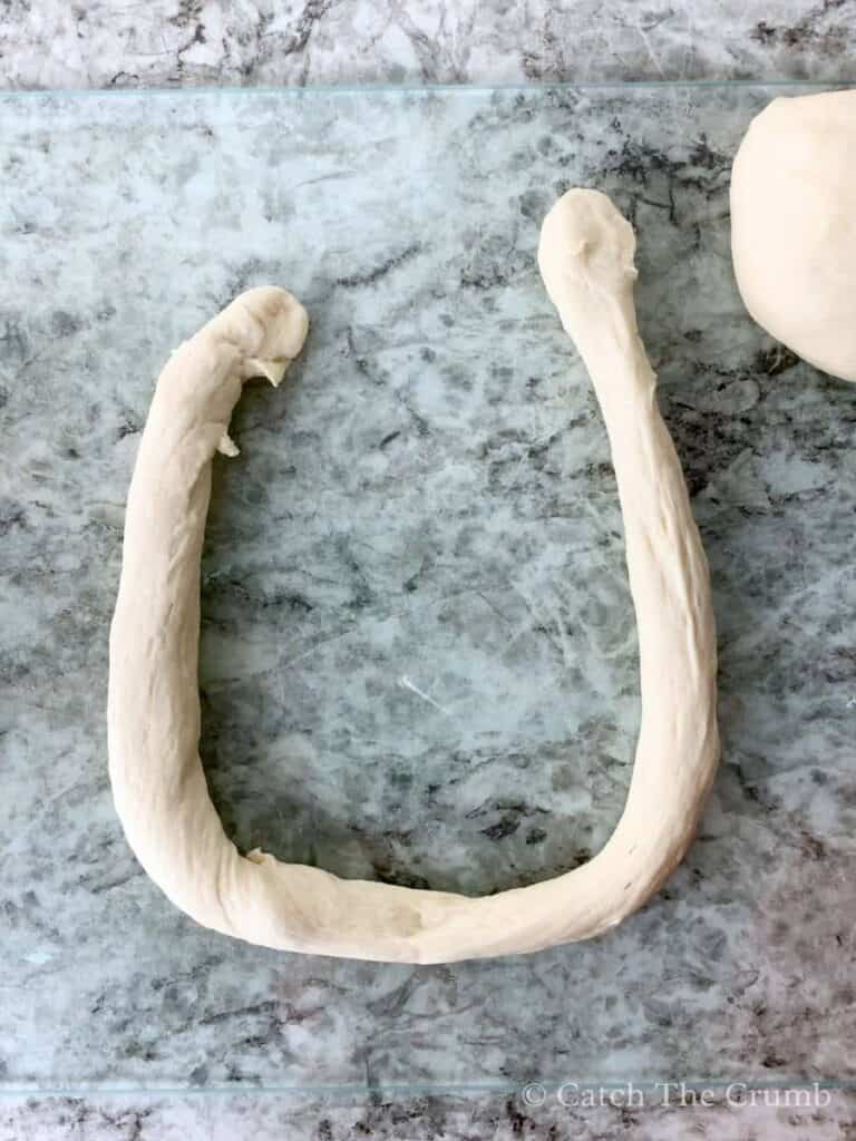 creating a u-shape with the dough
