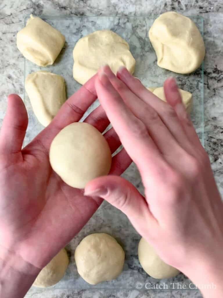 dough ball forming inside mixing bowl