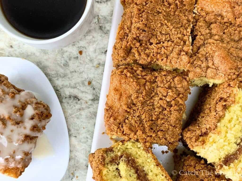 sourdough discard coffee cake and a cup of coffee