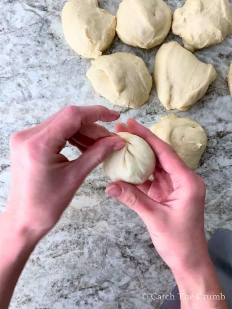 tucking the edges underneath and sealing the bottom